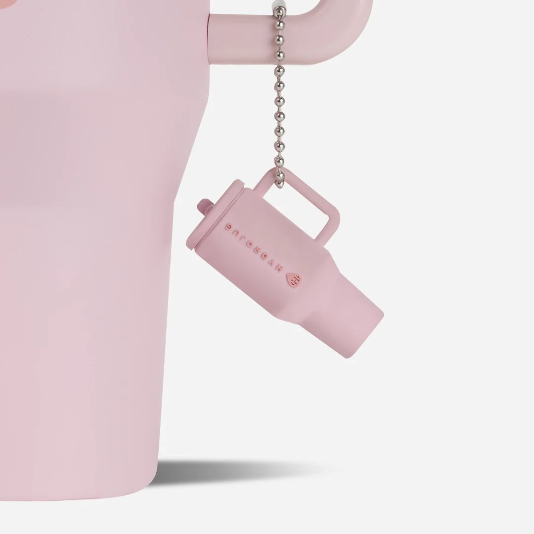traveler-keychain-w4 Web-TravelerKeychainPhotos-PinkSand2.webp